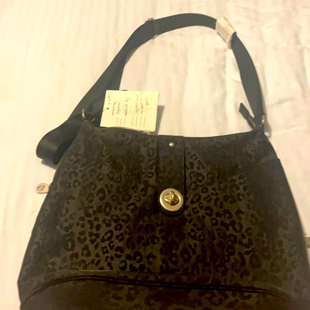 Bagolini cross body bag never been used was given as a gift